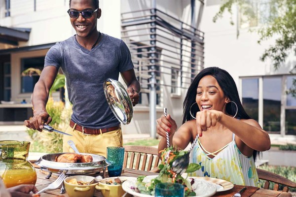 Family eating outdoors together