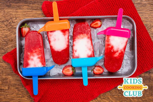 Red and white homemade ice pops in mold