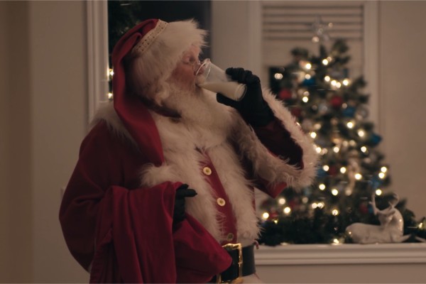 Santa drinking a glass of Canadian milk