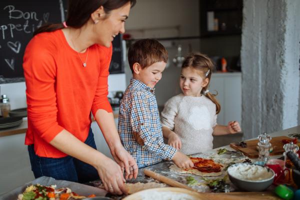 Kids help cook a meal 