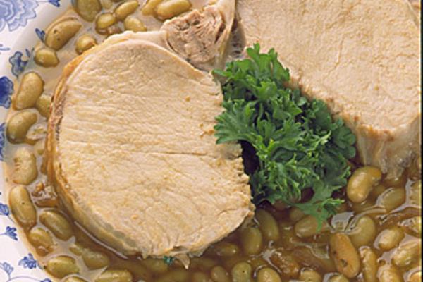 braised pork loin chops with green flageolet beans