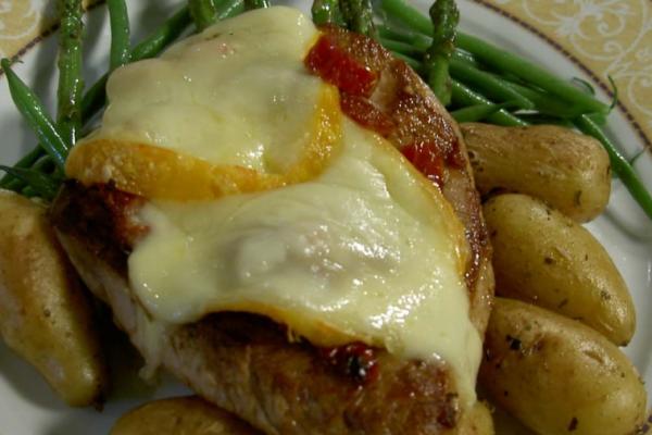veal cutlets with sun dried tomatoes and melting mamirolle cheese