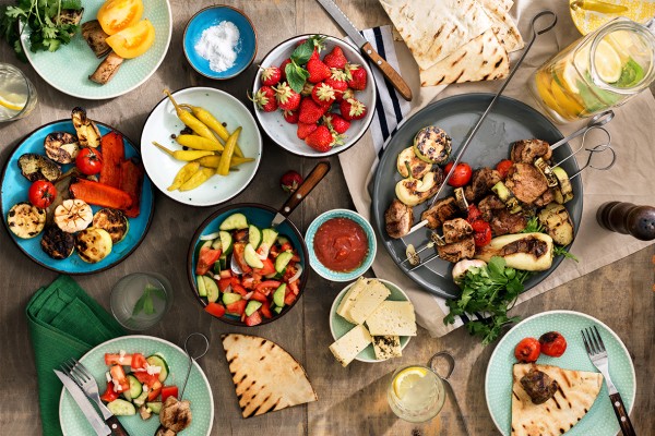 A table filled with tasty barbecued fare