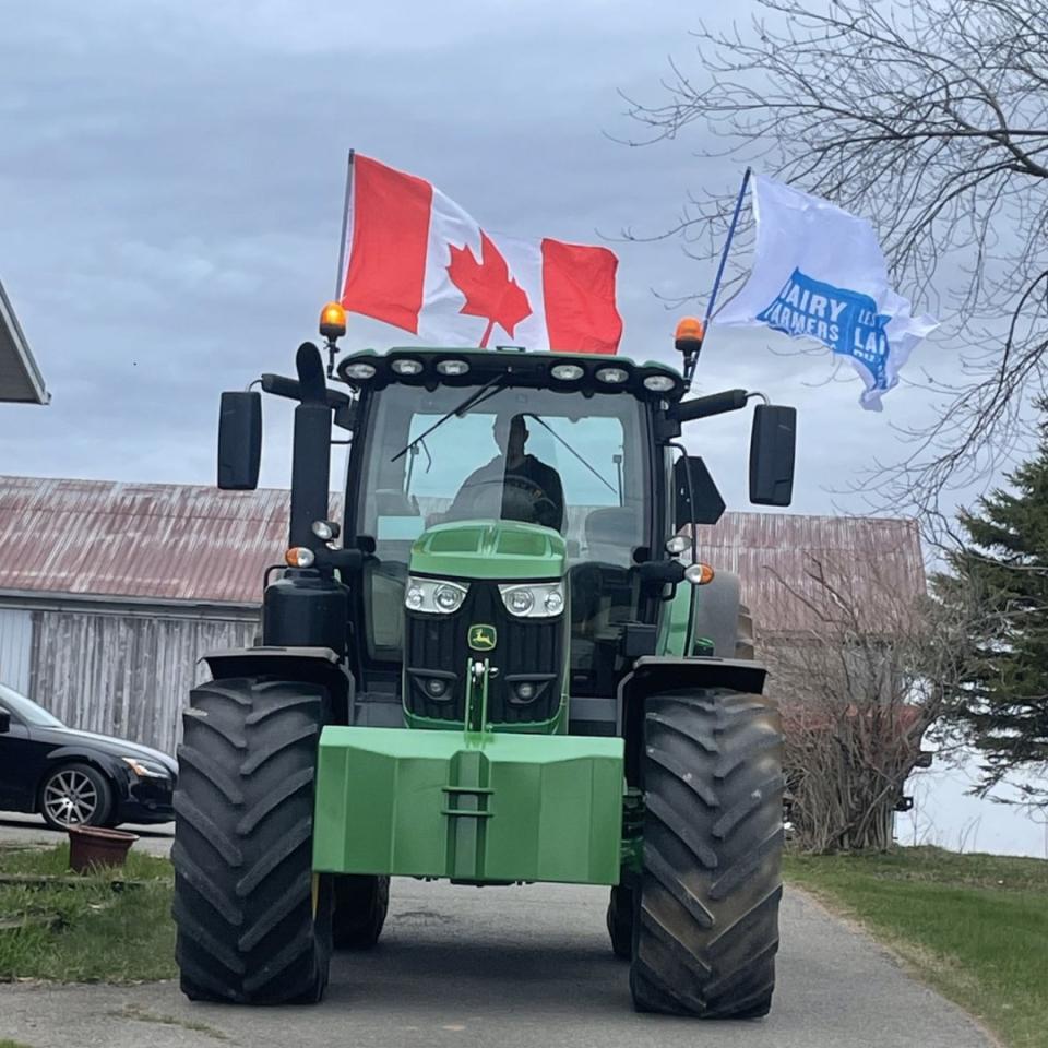 A tracker with a Dairy Farmers of Canada flag