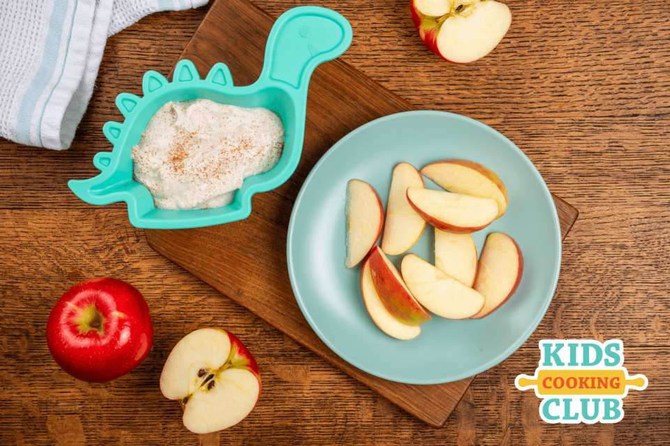 Apple Pie Yogurt Dip with apple slices and whole apples