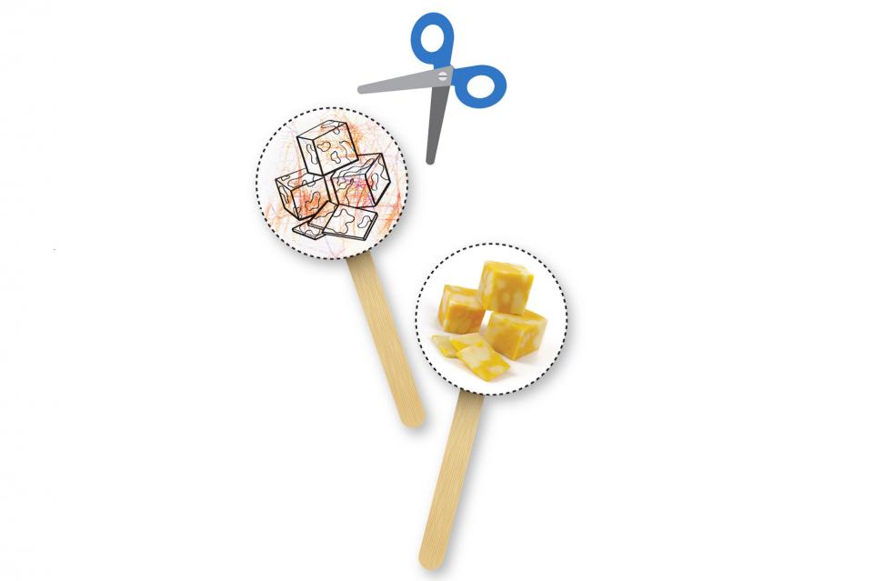 Cheese cube stick puppets with scissors icon.