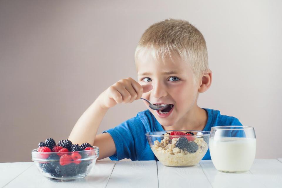 Boy eating breakfast