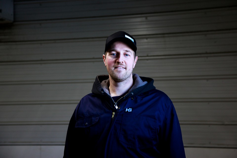 A Canadian dairy farmer in a barn