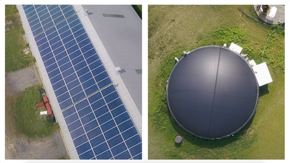 Aerial shot of a solar panel array and a biodigester on a Canadian dairy farm