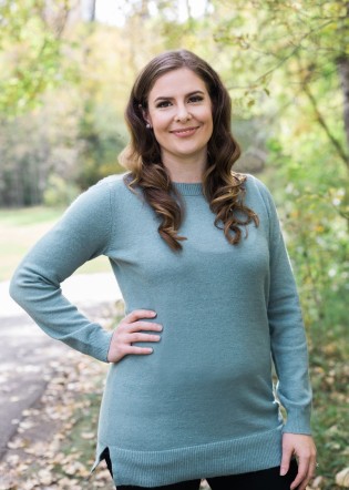 Picture of Lindsay with a path and trees in the background