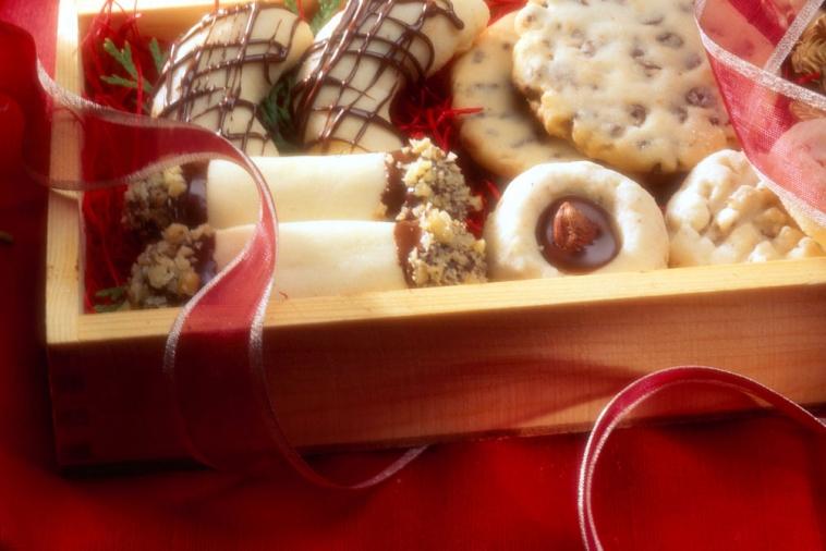 A variety of butter cookies served in a wooden gift box