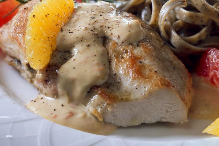 chicken breasts with citrus fruit and cream cheese sauce