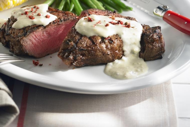 grilled pink peppercorn steak with creamy cambozola sauce