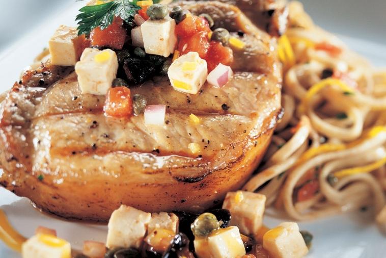 grilled pork chops and zesty sauce vierge with feta