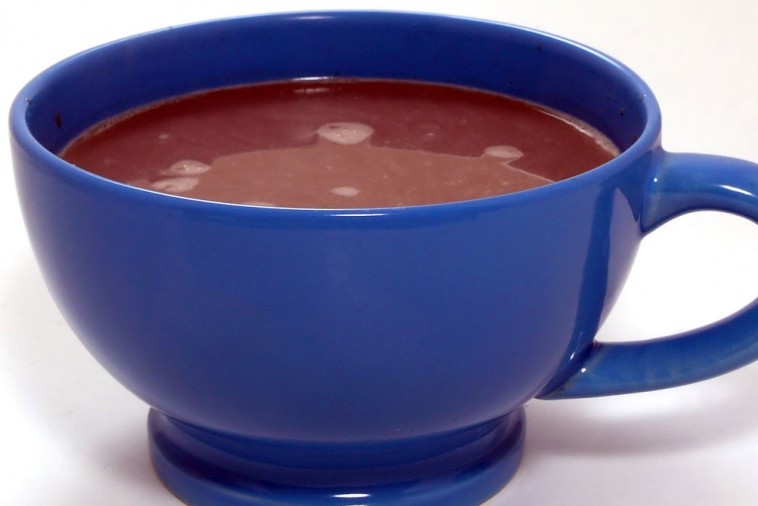 Steaming mug of hot chocolate milk