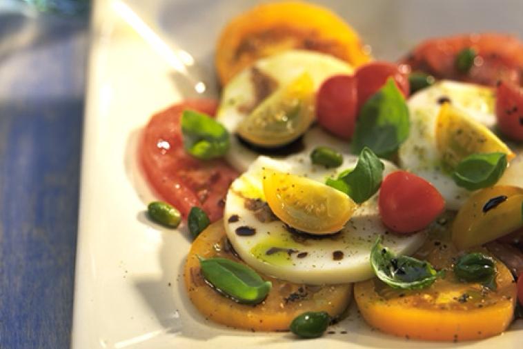 marinated cheese salad with pistachios and tomatoes
