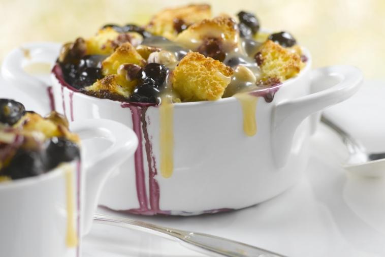 new brunswick blueberry lemon and white chocolate bread pudding with maple cream sauce
