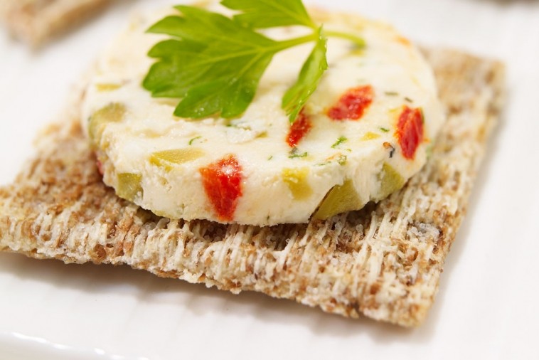 traditional cheddar terrine with herbs and olives