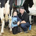 A Canadian farmer with his child