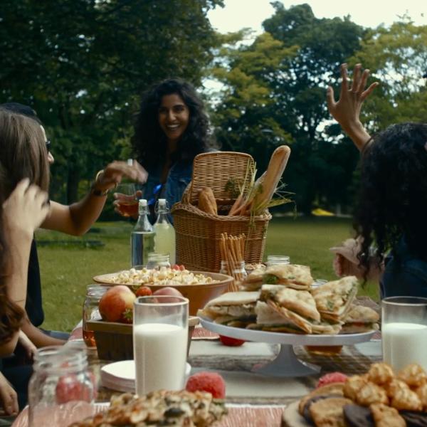 image of people enjoying an outdoor picnic