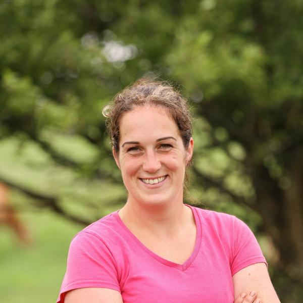 Smiling woman outdoors.