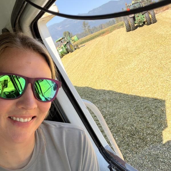Sarah in farm vehicle