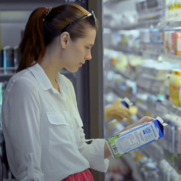 Woman looking at dairy products